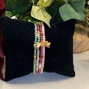 Holiday Cheer Bracelet Set – Gold Bow Accent, Set of 4